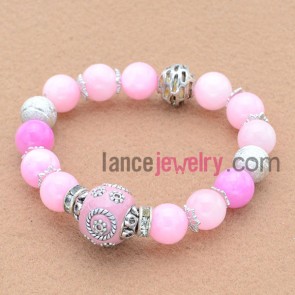 Delicate pink color stone bead bracelet with alloy parts.