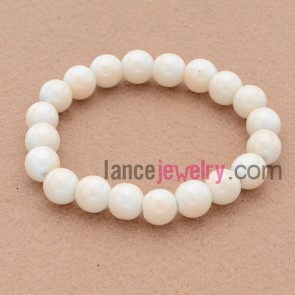 Delicate stone material bead bracelet.