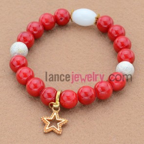 Gorgeous red color bead bracelet with rhinestone star pendant.