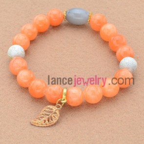 Transparent stone bead&alloy findings decorated bead bracelet with leaf pendant.