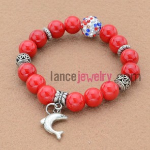 Nice rhinestone and alloy findings bead bracelet with dolphin pendant.