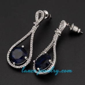 Beautiful earrings decorated with blue cubic zirconia
