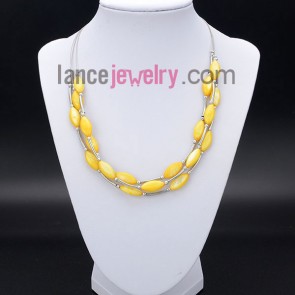 Cute necklace with bright yellow 
shell beads