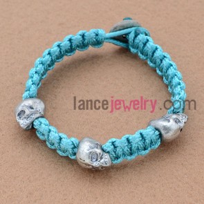 Blue wax cord weaving bracelet with alloy skulls ornate