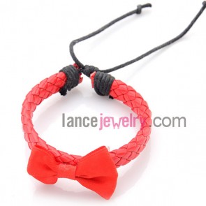 Leather based bracelet with bow tie decoration
