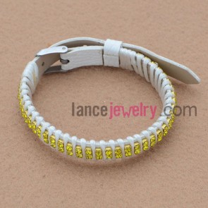 Leather besed bracelet with rhinestone and cord