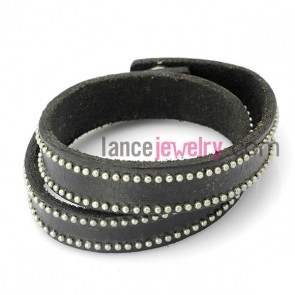 Fashion bracelet with black leather decorated many small size alloy beads and snap fastener 
