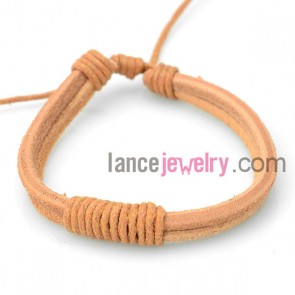 Sweet bracelet decorated with orange leather and rubber 
