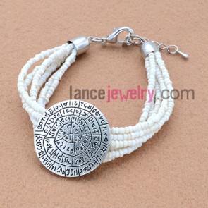 Elegant seed bead bracelet with big alloy finding ornate