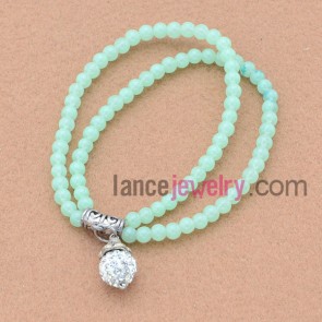 Green color stone bead bracelet with fashion rhinestone pendant.