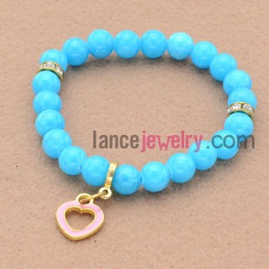 Fantastic blue color and rhinestone bead bracelet with nice pendant.