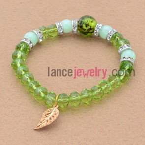 Delicate green color stone&rhinestone bead bracelet with leaf pendant.
