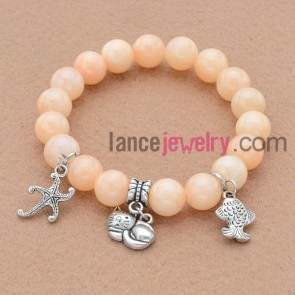 Fashion bead bracelet with sweet cat,fish and starfish pendant.