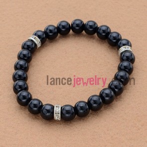 Classic dark color bead bracelet with rhinestone decoration.
