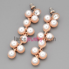 Dazzling earrings with glod brass and many abs beads and rhinestone decorated pendant