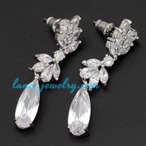 Delicate cubic zirconia pendants decorated the earrings