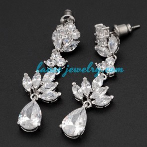 Original brass alloy earrings decorated with cubic zirconia