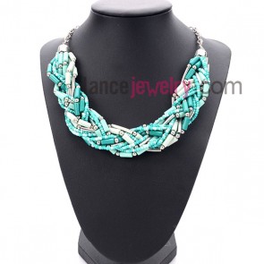 Fashion blue color necklace with several silver beads 
