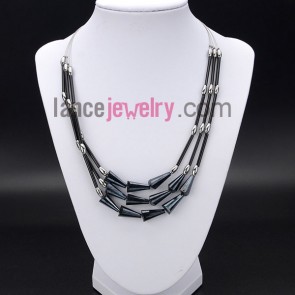 Cool necklace decorated with shining black crystal and glass tube