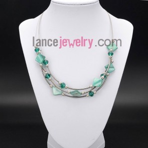 Romantic necklace with light green 
shell and beads