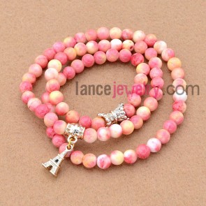 Gradient color stone bead bracelet with nice Eiffel Tower pendant.