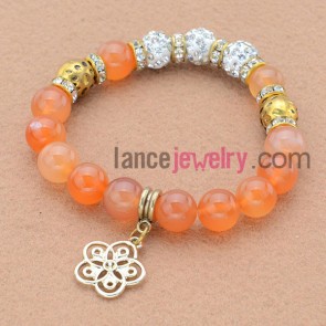 Special alloy parts and rhinestone bead bracelet with lsweet pendant.