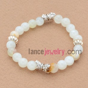 Delicate bead bracelet with special alloy findings.