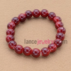 Fashion maroon color bead bracelet.