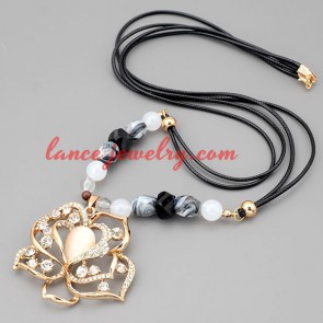 Charming necklace with black hide rope & cat eye pendant 