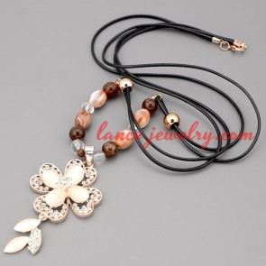 Mignon necklace with black hide rope & cute flower pendant 