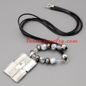 Attractive necklace with black hide rope & cat eye pendant 