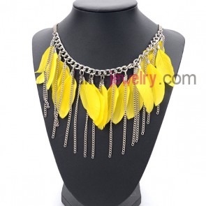 Gorgeous necklace with chain pendant and bright yellow feathers

