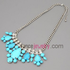 Nice necklace with claw chain and rhinestone and blue resin with special shsape pendant
