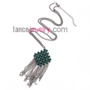 Classical necklace with shiny crystal beads and chain pendant 
