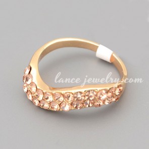 Shiny ring with many gold rhinestone decorated