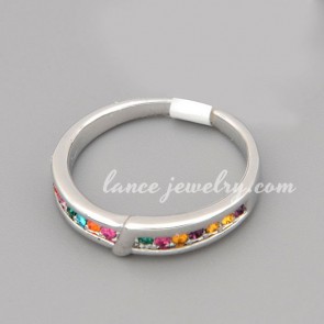 Colorful ring with many shiny multicolor rhinestone decorated